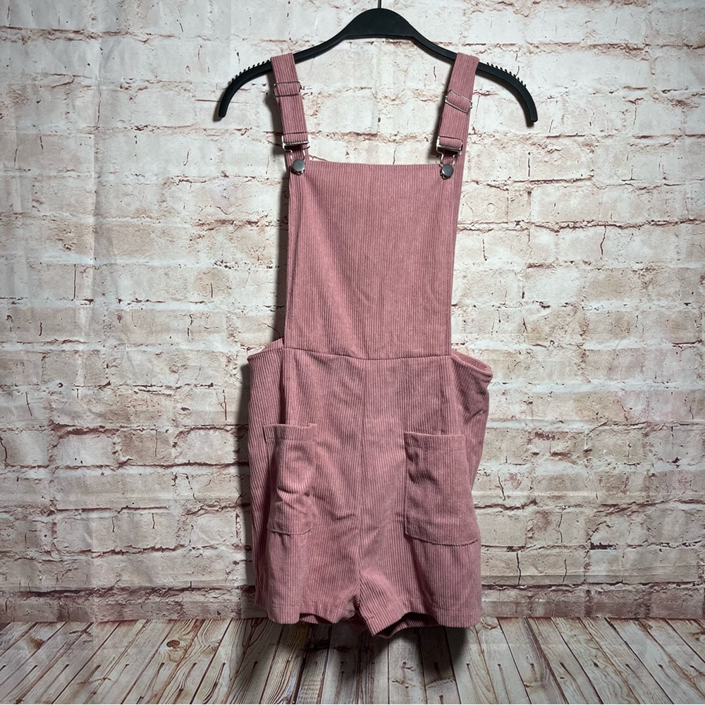 Pink corduroy one piece jumper size medium